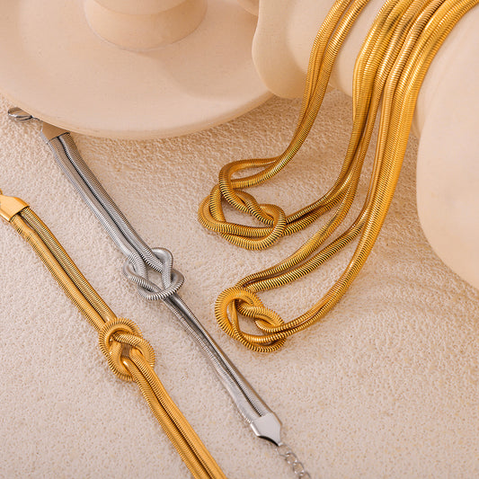 Titanium Steel Knot Bracelet - 2 COLORS  M^L