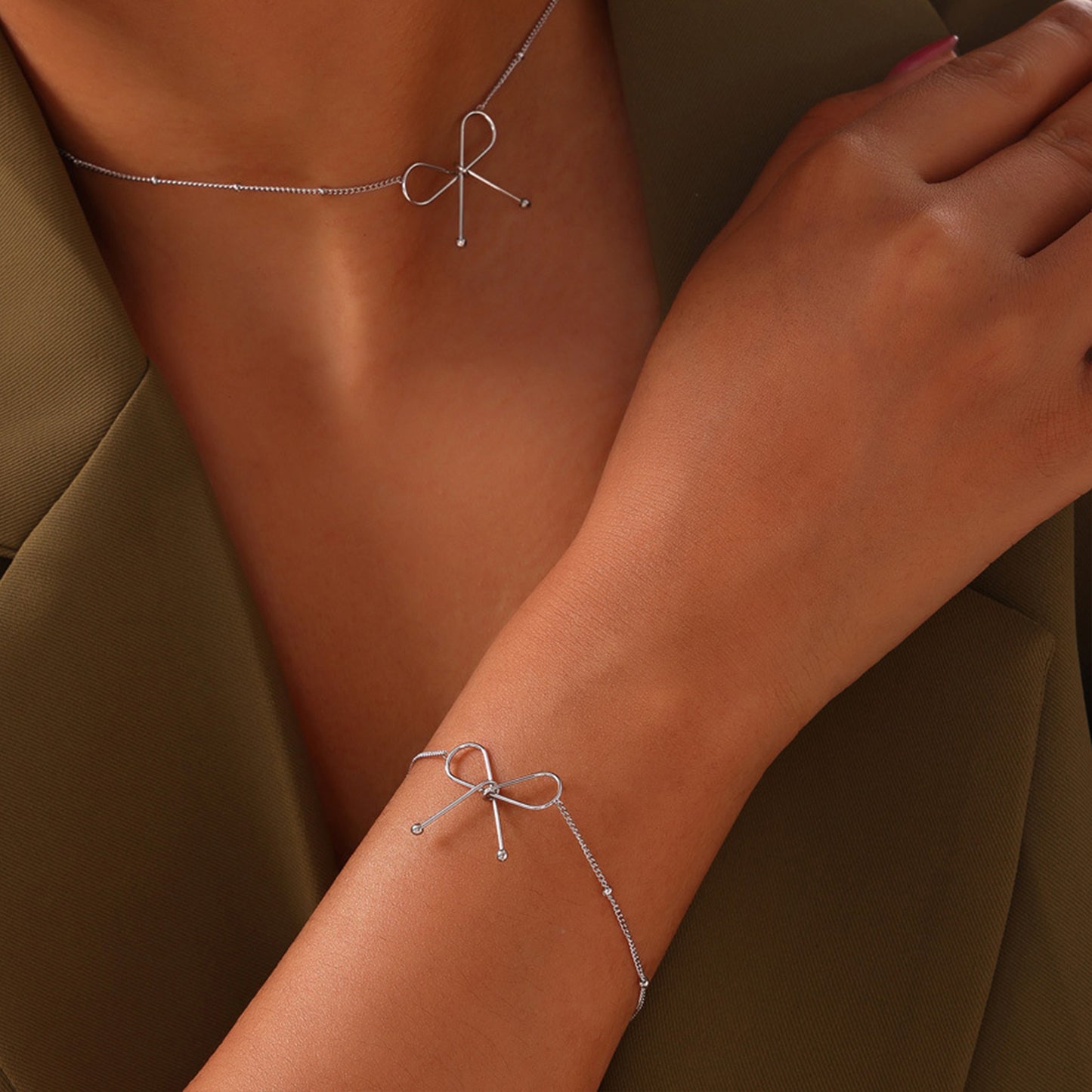 Titanium Steel Bow Bracelet - 3 COLORS  M^L